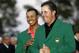 Tiger had the duty of helping Phil put on his green jacket at the 2006 Masters.