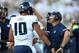 EAST LANSING, MI - AUGUST 31: Head coach Matt Wells of the Utah State Aggies celebrates with Jordan Love #10 after he scored a first half touchdown against the Michigan State Spartans at Spartan Stadium on August 31, 2018 in East Lansing, Michigan. (Photo