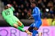 Unites States' goalkeeper Ethan Horvath (L) saves the ball in front of Italy's forward Moise Kean (R) during the friendly football match between Italy and the USA at the Luminus Arena Stadium in Genk on November 20, 2018. (Photo by JOHN THYS / AFP)