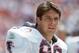 SAN FRANCISCO - SEPTEMBER 19: Defensive end Tim Green #76 of the Atlanta Falcons looks on as he stand on the sidelines during a game against the San Francisco 49ers at Candlestick Park on September 19, 1993 in San Francisco, California. The 49ers won 37
