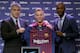 Barcelona's new player Brazilian midfielder Arthur Henrique Ramos de Oliveira Melo (C) poses with Barcelona's vice-president Spanish Jordi Mestre (L) and Barcelona's technical secretary French Eric Abidal (R) during a press conference at the Auditorium 18