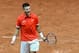 Croatia's Borna Coric celebrates after victory in his singles rubber against France's Jeremy Chardy during the Davis Cup final tennis match between France and Croatia at The Pierry-Mauroy Stadium in northern France on November 23, 2018. (Photo by DENIS C