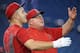 TORONTO, CANADA - AUGUST 25: Manager Mike Scioscia #14 of the Los Angeles Angels of Anaheim frolics with Mike Trout #27 during batting practice before the start of MLB game action against the Toronto Blue Jays on August 25, 2016 at Rogers Centre in Toront