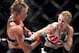 Shevchenko lands a right hand on Holly Holm at UFC on Fox 20.