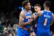 BOSTON, MA - NOVEMBER 21: Frank Ntilikina #11 and Emmanuel Mudiay #3 of the New York Knicks celebrate with teammate Trey Burke #23 during a game against the Boston Celtics at TD Garden on November 21, 2018 in Boston, Massachusetts. NOTE TO USER: User exp