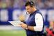INDIANAPOLIS, INDIANA - NOVEMBER 18: Head Coach Mike Vrabel of the Tennessee Titans reviews his play chart in the game against the Indianapolis Colts in the third quarter at Lucas Oil Stadium on November 18, 2018 in Indianapolis, Indiana. (Photo by Andy L