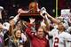 ATLANTA, GA - DECEMBER 01: Head coach Nick Saban and the Alabama Crimson Tide celebrate with the trophy after defeating the Georgia Bulldogs 35-28 in the 2018 SEC Championship Game at Mercedes-Benz Stadium on December 1, 2018 in Atlanta, Georgia. (Photo