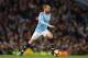 Manchester City's Spanish midfielder David Silva runs with the ball during the English Premier League football match between Manchester City and Bournemouth at the Etihad Stadium in Manchester, north west England, on December 1, 2018. (Photo by Oli SCARFF