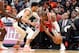 DENVER, CO - FEBRUARY 25: Chris Paul #3 of the Houston Rockets is guarded by Jamal Murray #27 of the Denver Nuggets at Pepsi Center on February 25, 2018 in Denver, Colorado. NOTE TO USER: User expressly acknowledges and agrees that, by downloading and or