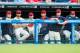 CLEVELAND, OH - OCTOBER 4: Trevor Bauer #47, Mike Aviles #4, Jason Kipnis #22, Carlos Carrasco #59, Yan Gomes #10, Corey Kluber #28 of the Cleveland Indians watch from the dugout during the eighth inning against the Boston Red Sox at Progressive Field on