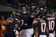 CHICAGO, IL - DECEMBER 09: Bradley Sowell #79 of the Chicago Bears celebrates with teammates after scoring a touchdown in the third quarter against the Los Angeles Rams at Soldier Field on December 9, 2018 in Chicago, Illinois. (Photo by Jonathan Daniel
