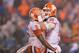 CHARLOTTE, NC - DECEMBER 01: Tee Higgins #5 celebrates with Trevor Lawrence #16 of the Clemson Tigers after scoring a touchdown against the Pittsburgh Panthers during the second quarter of their game at Bank of America Stadium on December 1, 2018 in Char