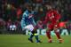 LIVERPOOL, ENGLAND - DECEMBER 11: Kalidou Koulibaly of Napoli and Georginio Wijnaldum of Liverpool during the UEFA Champions League Group C match between Liverpool and SSC Napoli at Anfield on December 11, 2018 in Liverpool, United Kingdom. (Photo by Matt