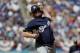 LOS ANGELES, CA - OCTOBER 17: Pitcher Wade Miley #20 of the Milwaukee Brewers pitches during the first inning of Game Five of the National League Championship Series against the Los Angeles Dodgers at Dodger Stadium on October 17, 2018 in Los Angeles, Ca