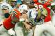 MIAMI GARDENS, FL - NOVEMBER 24: Kenny Pickett #8 of the Pittsburgh Panthers is sacked by Michael Jackson #28 of the Miami Hurricanes during the second half at Hard Rock Stadium on November 24, 2018 in Miami Gardens, Florida. (Photo by Michael Reaves/Ge
