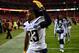 KANSAS CITY, MISSOURI - DECEMBER 13: Defensive back Rayshawn Jenkins #23 of the Los Angeles Chargers waves to Kansas City Chiefs fans after the Chargers defeated the Chiefs with a final score of 29-28 to win the game at Arrowhead Stadium on December 13,