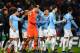 LEICESTER, ENGLAND - DECEMBER 18: Manchester City players celebrate following their sides victory in the penalty shoot out during the Carabao Cup Quarter Final match between Leicester City and Manchester City at The King Power Stadium on December 18, 201