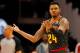 ATLANTA, GA - DECEMBER 05: Kent Bazemore #24 of the Atlanta Hawks reacts after being charged with a travel against the Washington Wizards at State Farm Arena on December 5, 2018 in Atlanta, Georgia. NOTE TO USER: User expressly acknowledges and agrees t