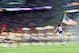 MINNEAPOLIS, MN - NOVEMBER 4: Danielle Hunter #99 of the Minnesota Vikings carries the flag onto the field during player introductions before the game against the Detroit Lions at U.S. Bank Stadium on November 4, 2018 in Minneapolis, Minnesota. (Photo by