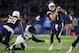 CARSON, CA - DECEMBER 22: Sam Tevi #69 blocks as Philip Rivers #17 of the Los Angeles Chargers eludes a tackle by Terrell Suggs #55 of the Baltimore Ravens during the second half of a game at StubHub Center on December 22, 2018 in Carson, California. (P