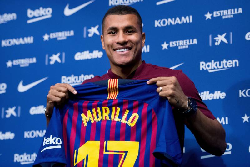 Barcelona's new player Colombian defender Jeison Murillo displays his jersey during his official presentation at the Camp Nou stadium in Barcelona on December 27, 2018. (Photo by Josep LAGO / AFP)        (Photo credit should read JOSEP LAGO/AFP/Getty Imag