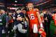 ARLINGTON, TEXAS - DECEMBER 29: Trevor Lawrence #16 of the Clemson Tigers celebrates after defeating the Notre Dame Fighting Irish during the College Football Playoff Semifinal Goodyear Cotton Bowl Classic at AT&T Stadium on December 29, 2018 in Arlington