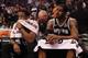 PHOENIX, AZ - NOVEMBER 14: DeMar DeRozan #10 and LaMarcus Aldridge #12 of the San Antonio Spurs react on the bench during the second half of the NBA game against the Phoenix Suns at Talking Stick Resort Arena on November 14, 2018 in Phoenix, Arizona. NOT