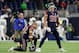 HOUSTON, TX - OCTOBER 25: Tyrann Mathieu #32 of the Houston Texans and J.J. Watt #99 watch players warm up before the game against the Miami Dolphins at NRG Stadium on October 25, 2018 in Houston, Texas. (Photo by Tim Warner/Getty Images)
