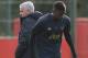 Manchester United's Portuguese manager Jose Mourinho (L) and Manchester United's French midfielder Paul Pogba (R) attend a training session at the Carrington Training complex in Manchester, north west England on October 22, 2018, ahead of their UEFA Champ