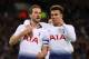 LONDON, ENGLAND - JANUARY 08: Harry Kane of Tottenham Hotspur celebrates after scoring his team's first goal with Dele Alli of Tottenham Hotspur during the Carabao Cup Semi-Final First Leg match between Tottenham Hotspur and Chelsea at Wembley Stadium on