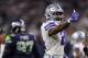 ARLINGTON, TEXAS - JANUARY 05: Ezekiel Elliott #21 of the Dallas Cowboys gestures for a first down against the Seattle Seahawks in the fourth quarter during the Wild Card Round at AT&T Stadium on January 05, 2019 in Arlington, Texas. (Photo by Tom Penning