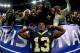 NEW ORLEANS, LOUISIANA - JANUARY 13: Michael Thomas #13 of the New Orleans Saints posses for a photo with the fans after his teams win over the Philadelphia Eagles in the NFC Divisional Playoff Game at Mercedes Benz Superdome on January 13, 2019 in New O