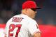 ANAHEIM, CA - SEPTEMBER 25: Mike Trout # 27 of the Los Angeles Angels of Anaheim looks at the game against the Texas Rangers at Angel Stadium on September 25, 2018 in Anaheim, California. (Photo by Sean M. Haffey / Getty Images)