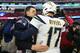 FOXBOROUGH, MASSACHUSETTS - JANUARY 13: Tom Brady #12 of the New England Patriots hugs Philip Rivers #17 of the Los Angeles Chargers after the AFC Divisional Playoff Game at Gillette Stadium on January 13, 2019 in Foxborough, Massachusetts. (Photo by Elsa