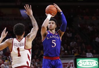 AMES, IA - JANUARY 5: Quentin Grimes #5 of the Kansas Jayhawks takes a shot as Nick Weiler-Babb #1 of the Iowa State Cyclones blocks in the second half of play at Hilton Coliseum on January 5, 2019 in Ames, Iowa. The Iowa State Cyclones won 77-60 over the