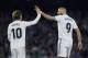 SEVILLE, SPAIN - JANUARY 13: Luka Modric of Real Madrid celebrates after scoring his team's first goal with his teammate Karim Benzema during the La Liga match between Real Betis Balompie and Real Madrid CF at Estadio Benito Villamarin on January 13, 2019