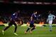Barcelona's Argentinian forward Lionel Messi (C) celebrates scoring their second goal with Barcelona's French forward Ousmane Dembele (L) during the Spanish League football match between FC Barcelona and RC Celta de Vigo at the Camp Nou stadium in Barcelo