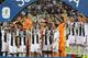 Juventus' players celebrate their Supercoppa Italiana final win against AC Milan at the King Abdullah Sports City Stadium in Jeddah on January 16, 2019. - Cristiano Ronaldo scored the only goal to hand Juventus their first trophy of the season with a 1-0