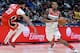 NEW ORLEANS, LOUISIANA - NOVEMBER 28:  Bradley Beal #3 of the Washington Wizards is defended by Anthony Davis #23 of the New Orleans Pelicans during a game at the Smoothie King Center on November 28, 2018 in New Orleans, Louisiana. NOTE TO USER: User expr