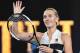 Czech Republic's Petra Kvitova celebrates her victory against Australia's Ashleigh Barty during their women's singles quarter-final match on day nine of the Australian Open tennis tournament in Melbourne on January 22, 2019. (Photo by William WEST / AFP)