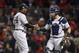 BOSTON, MA - OCTOBER 06: Catcher Gary Sanchez #24 of the New York Yankees congratulates closing pitcher Aroldis Chapman #54 after their 6-2 win in Game Two of the American League Division Series against the Boston Red Sox at Fenway Park on October 6, 20