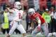 COLUMBUS, OH - SEPTEMBER 08: Artur Sitkowski #8 of the Rutgers Scarlet Knights throws a pass while under pressure from Nick Bosa #97 of the Ohio State Buckeyes in the first quarter of the game at Ohio Stadium on September 8, 2018 in Columbus, Ohio. (Photo