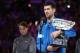 MELBOURNE, AUSTRALIA - JANUARY 27: Rafael Nadal of Spain looks on with the runners-up trophy following defeat in his Men's Singles Final match against Novak Djokovic of Serbia during day 14 of the 2019 Australian Open at Melbourne Park on January 27, 201