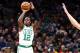 BOSTON, MA - JANUARY 28: Terry Rozier #12 of the Boston Celtics shoots during a game against the Brooklyn Nets at TD Garden on January 28, 2019 in Boston, Massachusetts. NOTE TO USER: User expressly acknowledges and agrees that, by downloading and or usi