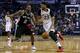 NEW ORLEANS, LA - MARCH 03: Anthony Davis #23 of the New Orleans Pelicans drives against Kawhi Leonard #2 of the San Antonio Spurs during the second half of a game at the Smoothie King Center on March 3, 2017 in New Orleans, Louisiana. NOTE TO USER: User