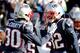 FOXBOROUGH, MASSACHUSETTS - JANUARY 13: Jason McCourty #30 of the New England Patriots and Devin McCourty #32 react during the second quarter in the AFC Divisional Playoff Game against the Los Angeles Chargers at Gillette Stadium on January 13, 2019 in Fo