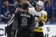 Tyler Johnson and Sidney Crosby battled in the second period.