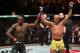 MELBOURNE, AUSTRALIA - FEBRUARY 10: (R-L) Anderson Silva of Brazil and Israel Adesanya of New Zealand react after the conclusion of their middleweight bout during the UFC 234 at Rod Laver Arena on February 10, 2019 in the Melbourne, Australia. (Photo by