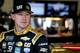 DAYTONA BEACH, FL - FEBRUARY 09: Daniel Hemric, driver of the #8 Bass Pro Shops/Caterpillar Chevrolet, stands in the garage area during practice for the Monster Energy NASCAR Cup Series 61st Annual Daytona 500 at Daytona International Speedway on Februa