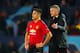 MANCHESTER, ENGLAND - FEBRUARY 12: Manchester United Head Coach / Manager Ole Gunnar Solskjaer consoles Alexis Sanchez of Manchester United at the end of the UEFA Champions League Round of 16 First Leg match between Manchester United and Paris Saint-Ger